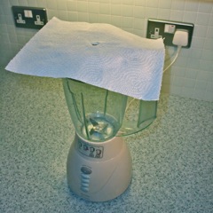 Pierce a paper towel and place over